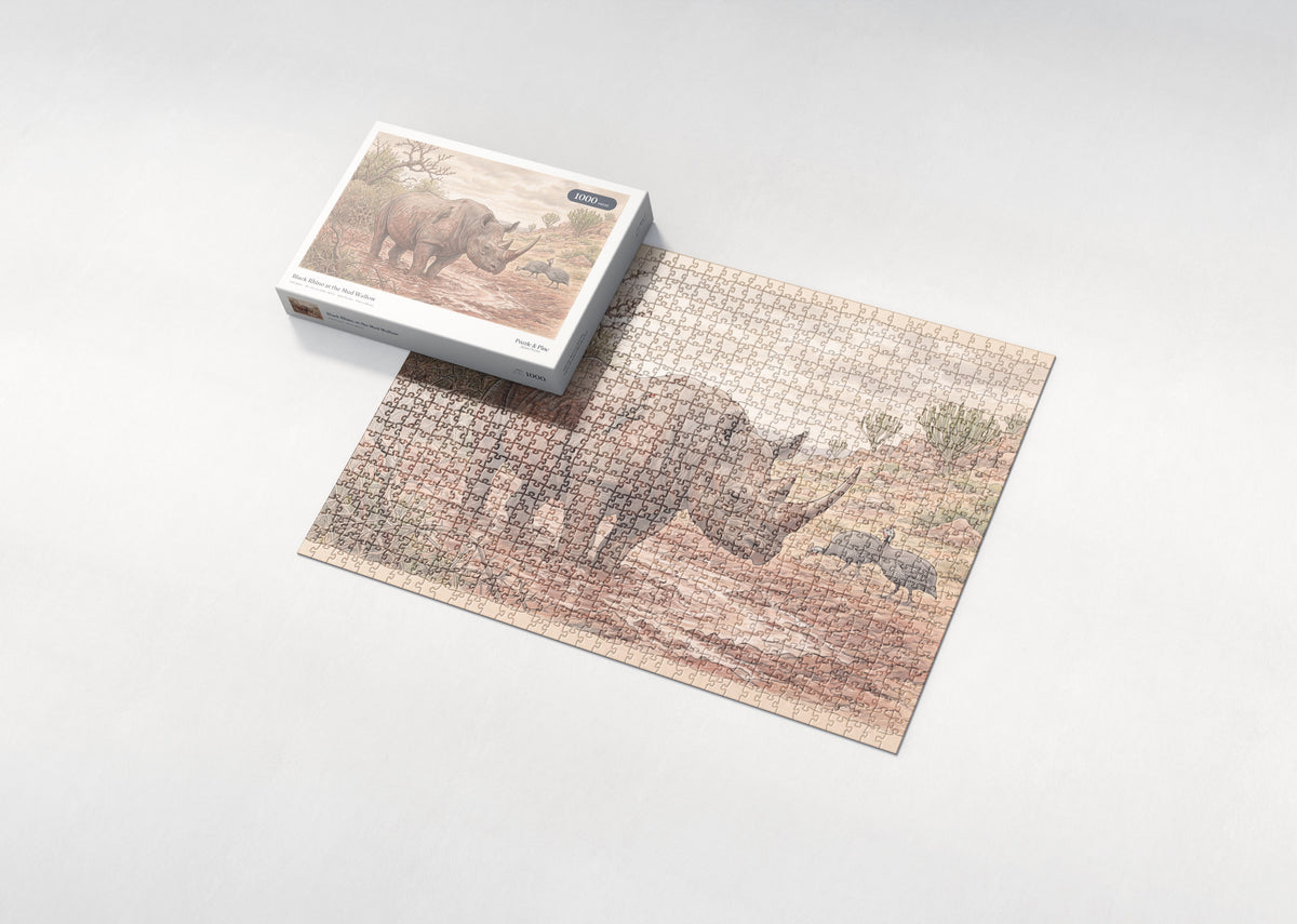 Black Rhino at the Mud Wallow jigsaw puzzle - box and puzzle