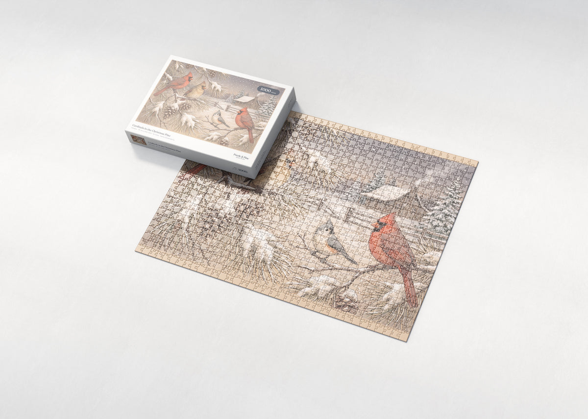 Cardinals in the Christmas Pine jigsaw puzzle - box and puzzle