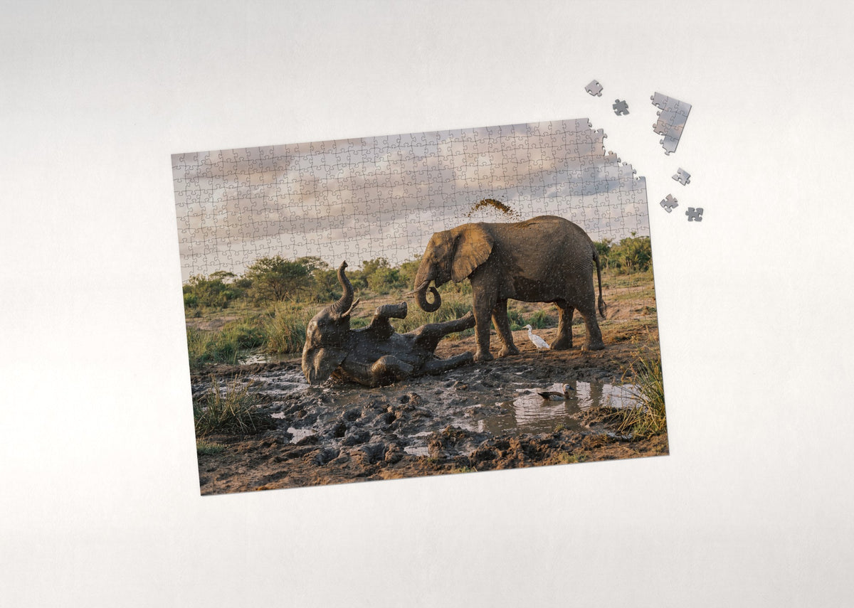 Elephant Calf Playing in the Mud jigsaw puzzle - puzzle with loose pieces