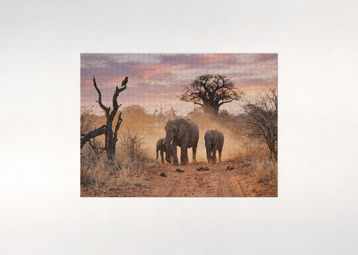 Elephants Walking the Dusty Trail at Dusk jigsaw puzzle - flat puzzle