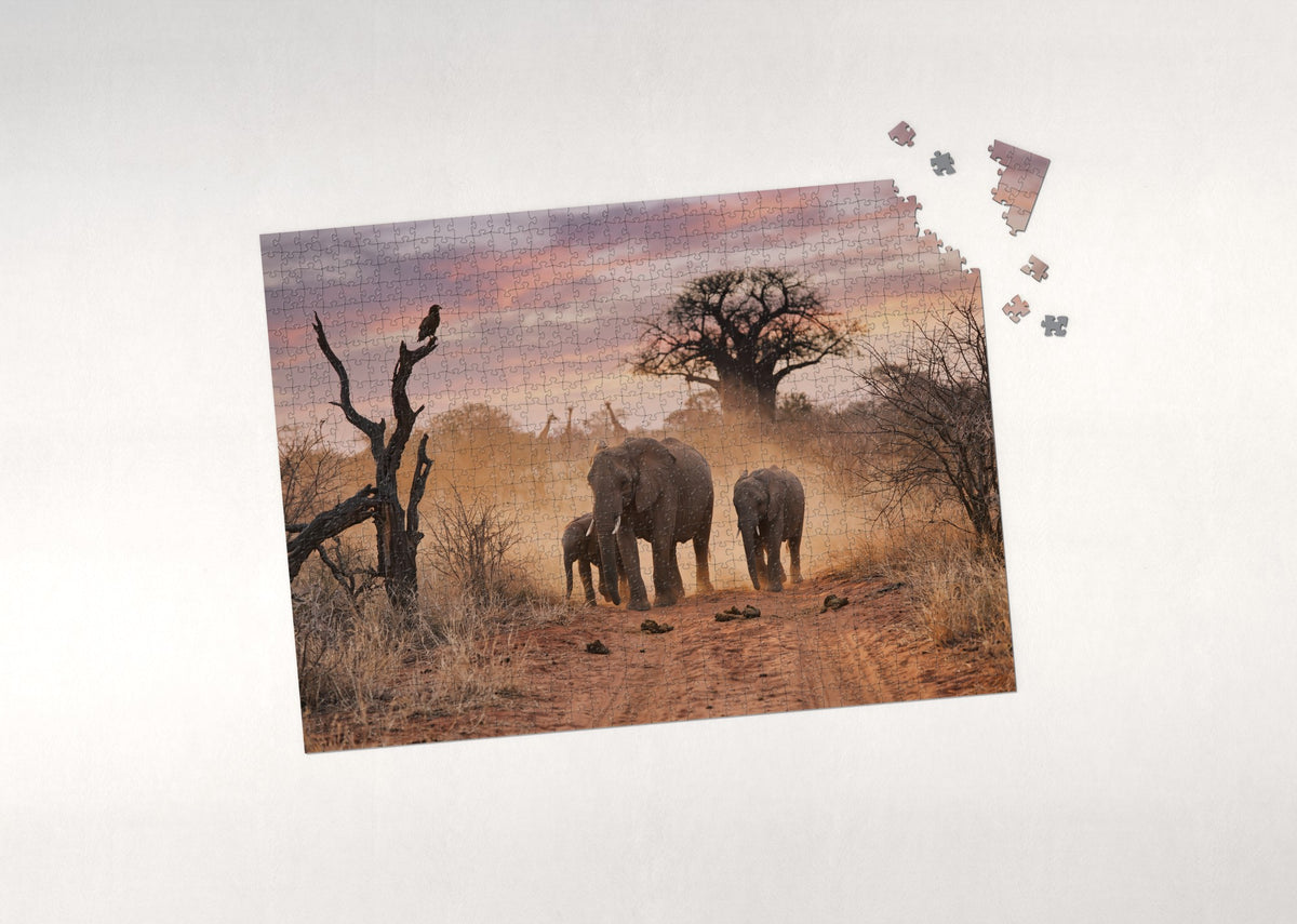Elephants Walking the Dusty Trail at Dusk jigsaw puzzle - puzzle with loose pieces