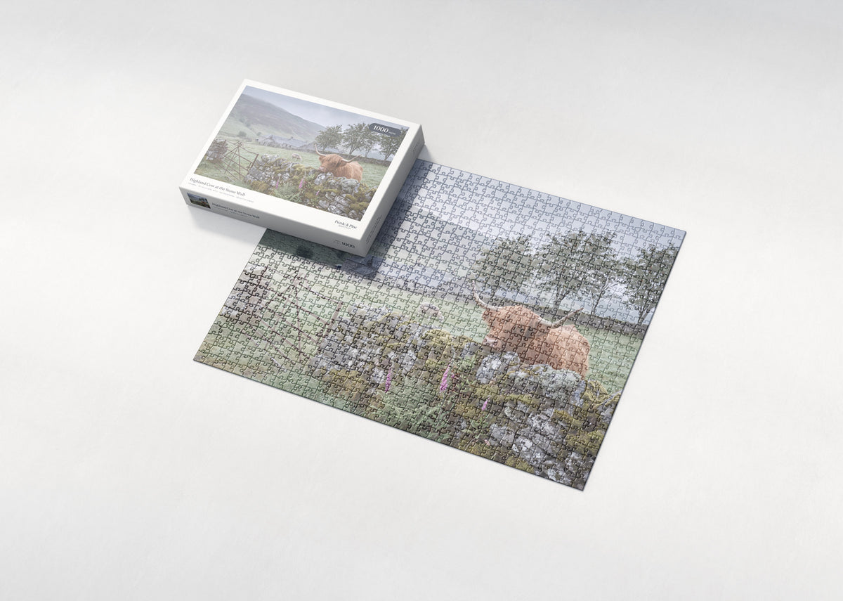 Highland Cow at the Stone Wall jigsaw puzzle - box and puzzle