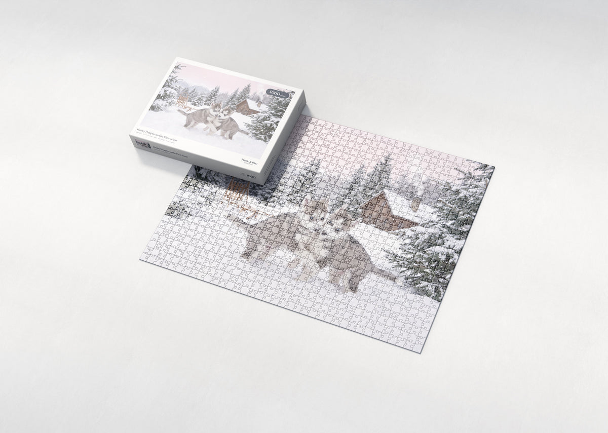 Husky Puppies in the First Snow jigsaw puzzle - box and puzzle