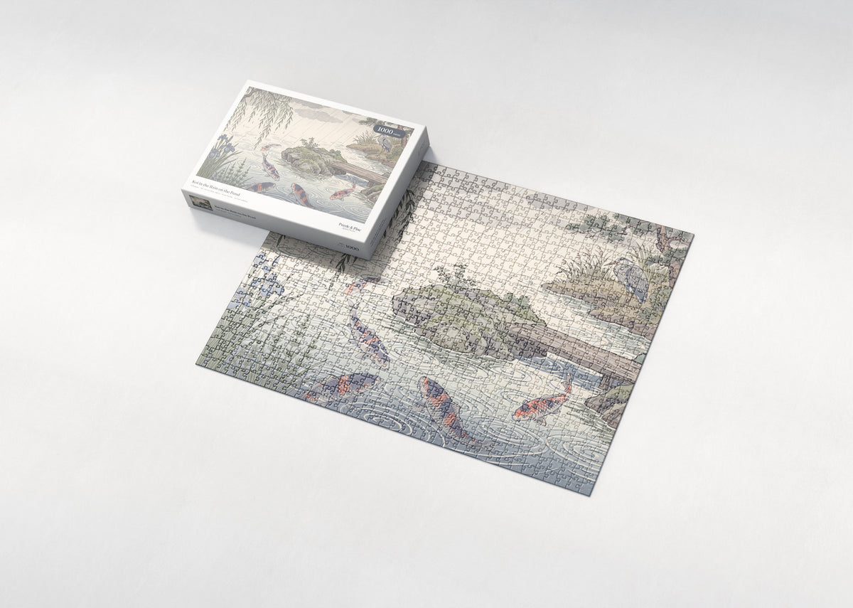 Koi in the Rain on the Pond jigsaw puzzle - box and puzzle