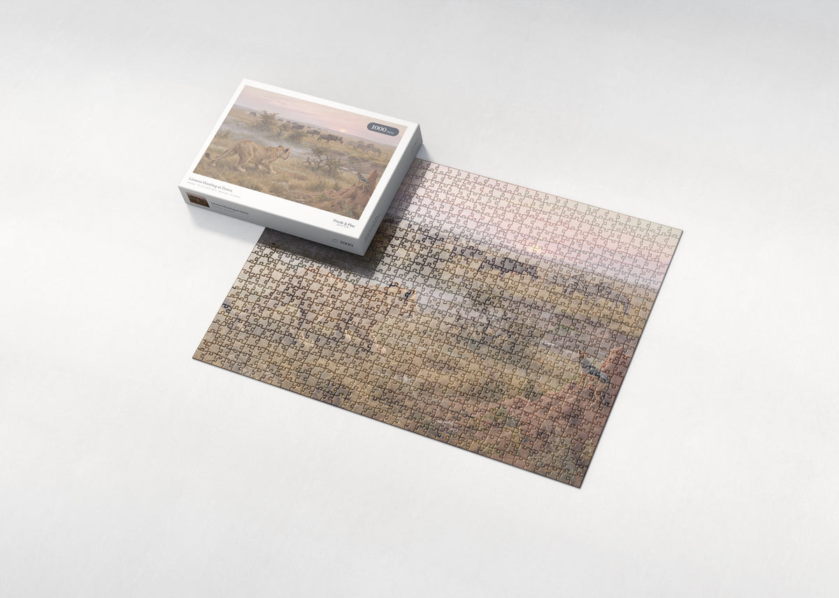 Lioness Hunting at Dawn jigsaw puzzle - box and puzzle