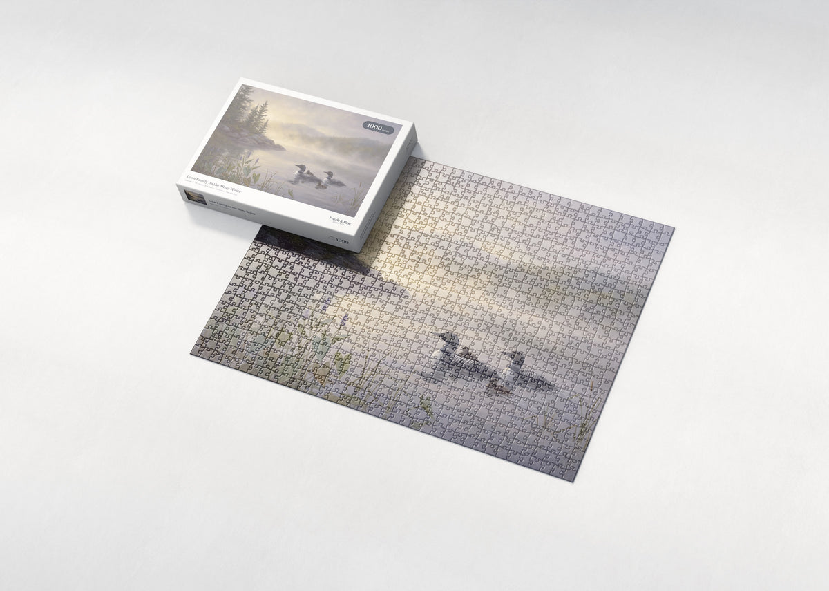 Loon Family on the Misty Water jigsaw puzzle - box and puzzle