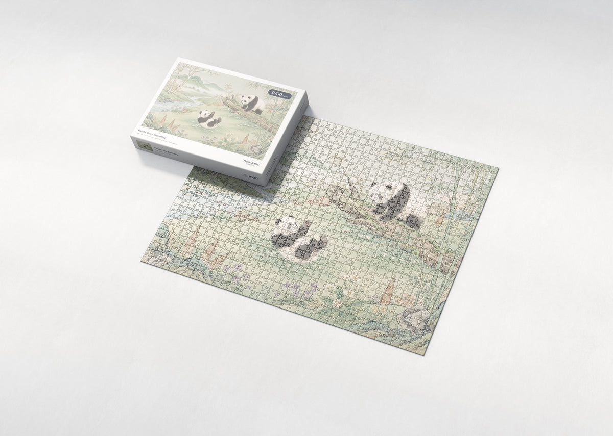 Panda Cubs Tumbling jigsaw puzzle - box and puzzle