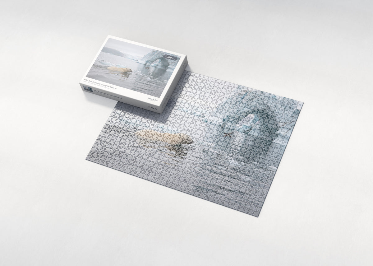 Polar Bear Swimming Among the Icebergs jigsaw puzzle - box and puzzle