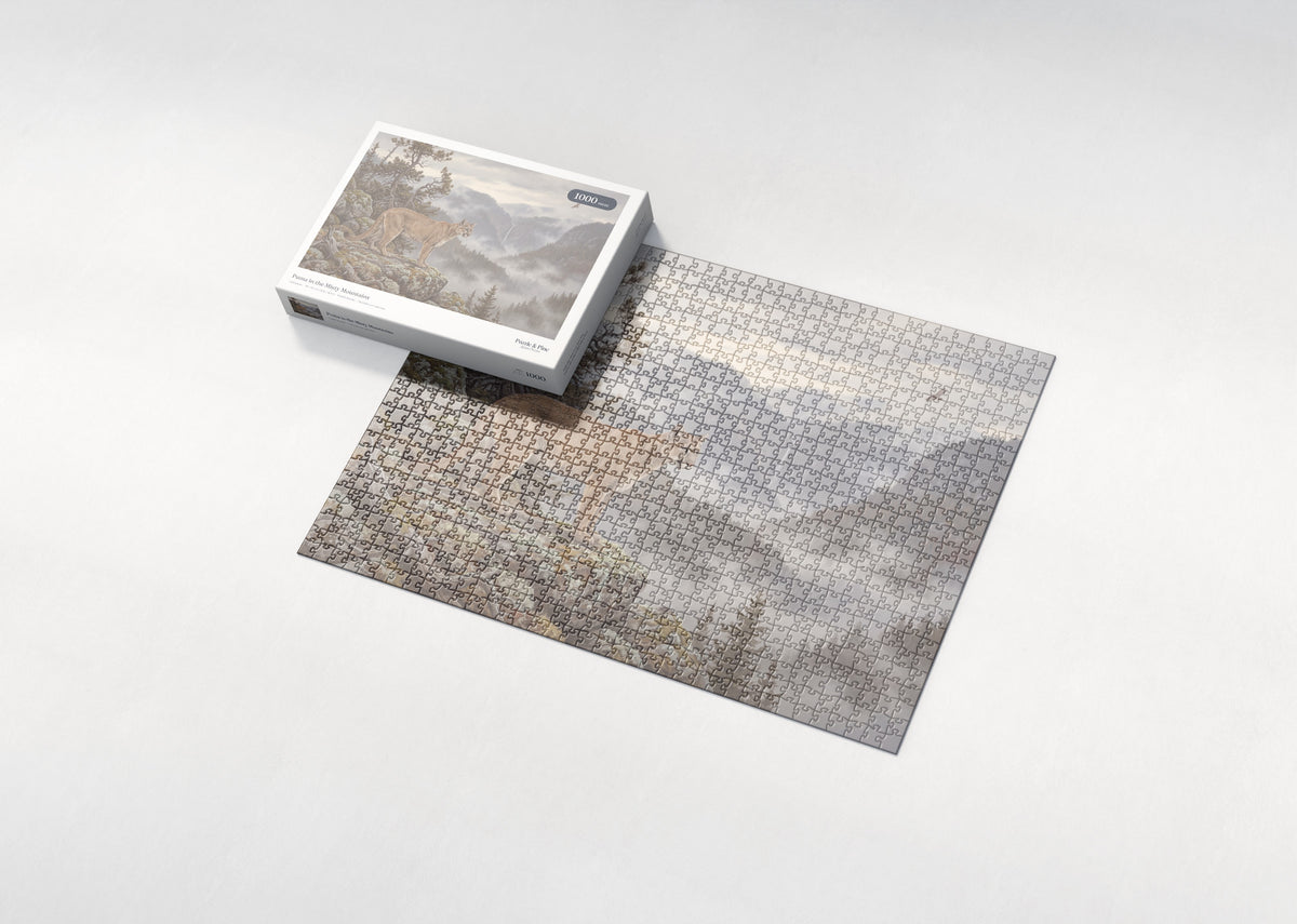 Puma in the Misty Mountains jigsaw puzzle - box and puzzle