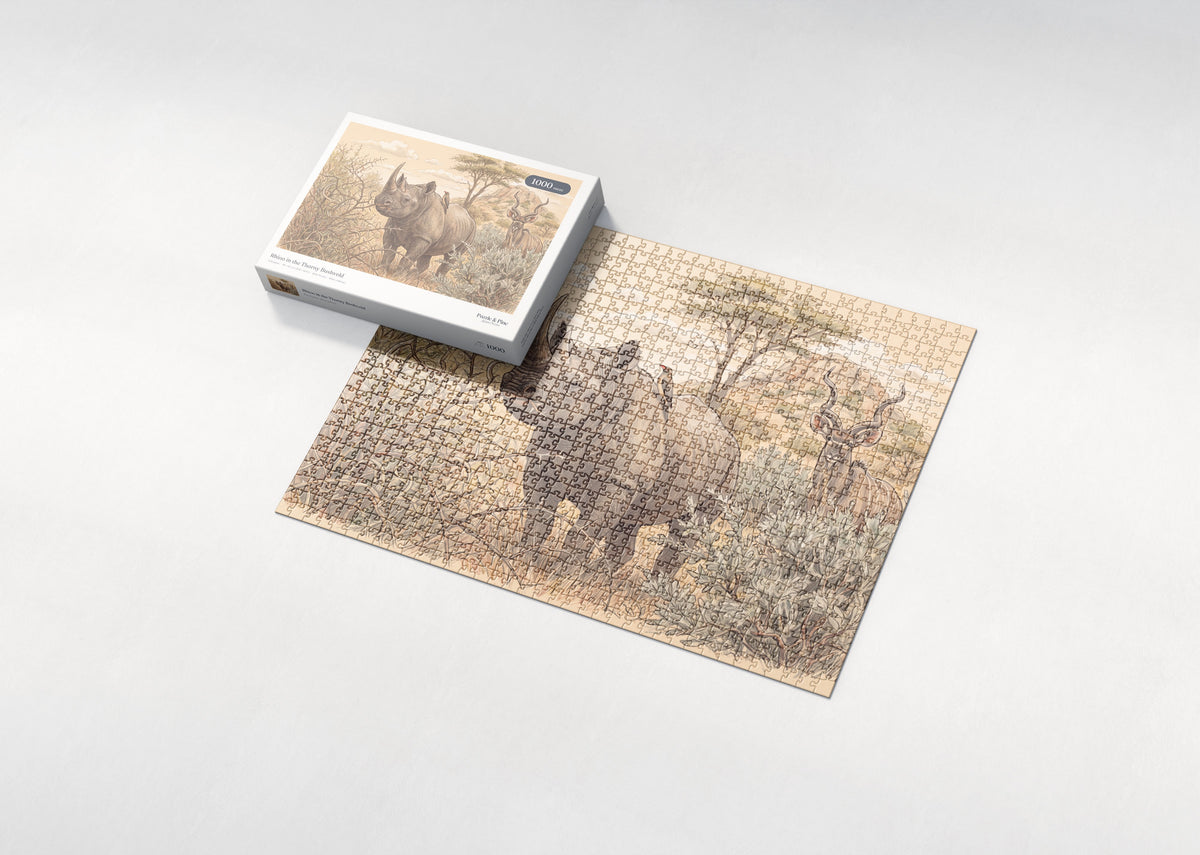 Rhino in the Thorny Bushveld jigsaw puzzle - box and puzzle