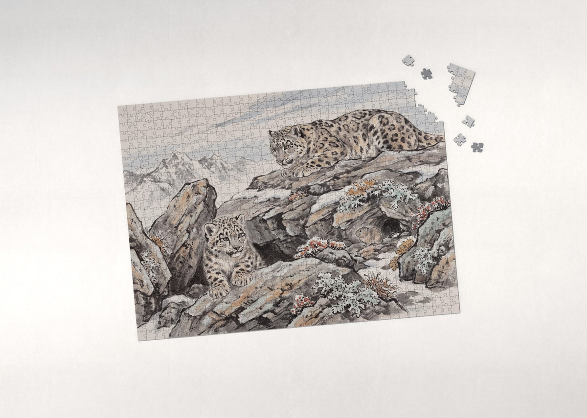 Snow Leopard Cub in the Rocks jigsaw puzzle - puzzle with loose pieces