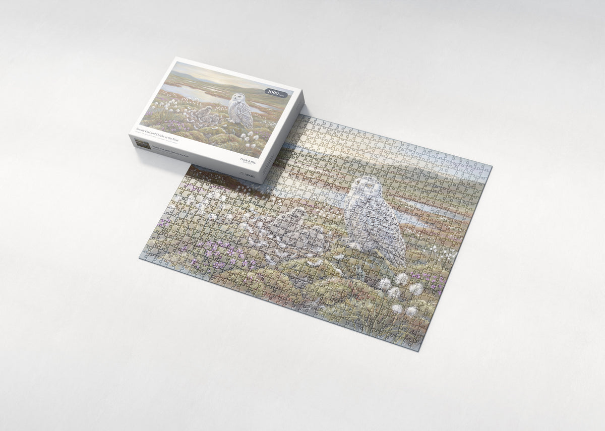 Snowy Owl and Chicks at the Nest jigsaw puzzle - box and puzzle