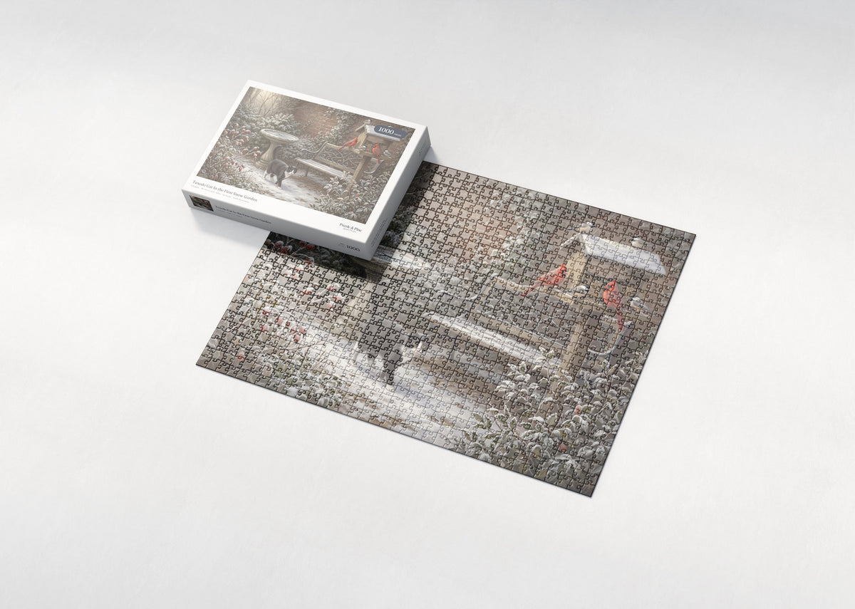 Tuxedo Cat In the First Snow Garden jigsaw puzzle - box and puzzle