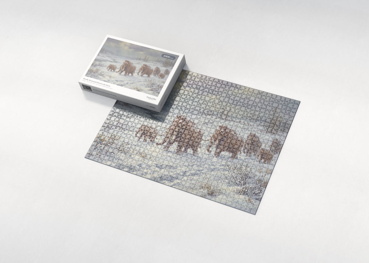 Woolly Mammoth Herd in the Snow jigsaw puzzle - box and puzzle